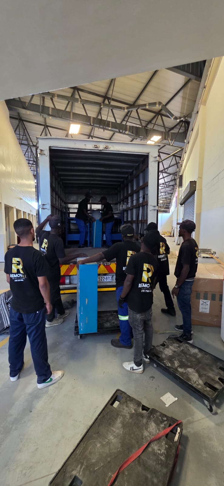 The RemovALL team loading a customer's belongings